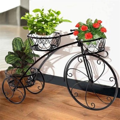 porte plante retro intérieur avec pot blanc et fleurs rouges