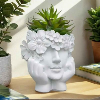pot de fleur diademe blanc en forme de visage féminin souriant
