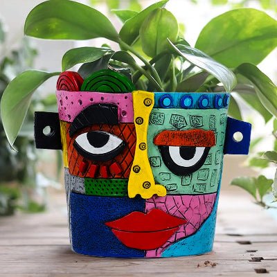 pot de fleur colorart avec plante verte