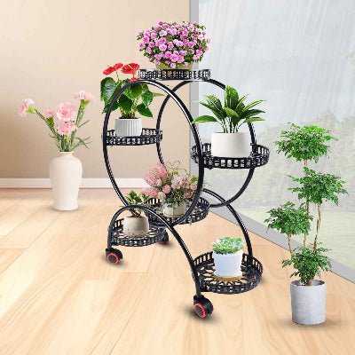 support pour les plantes noir chic rond sur roulettes